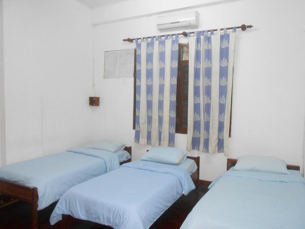 Saysouly Guesthouse Вьентьян Номер фото